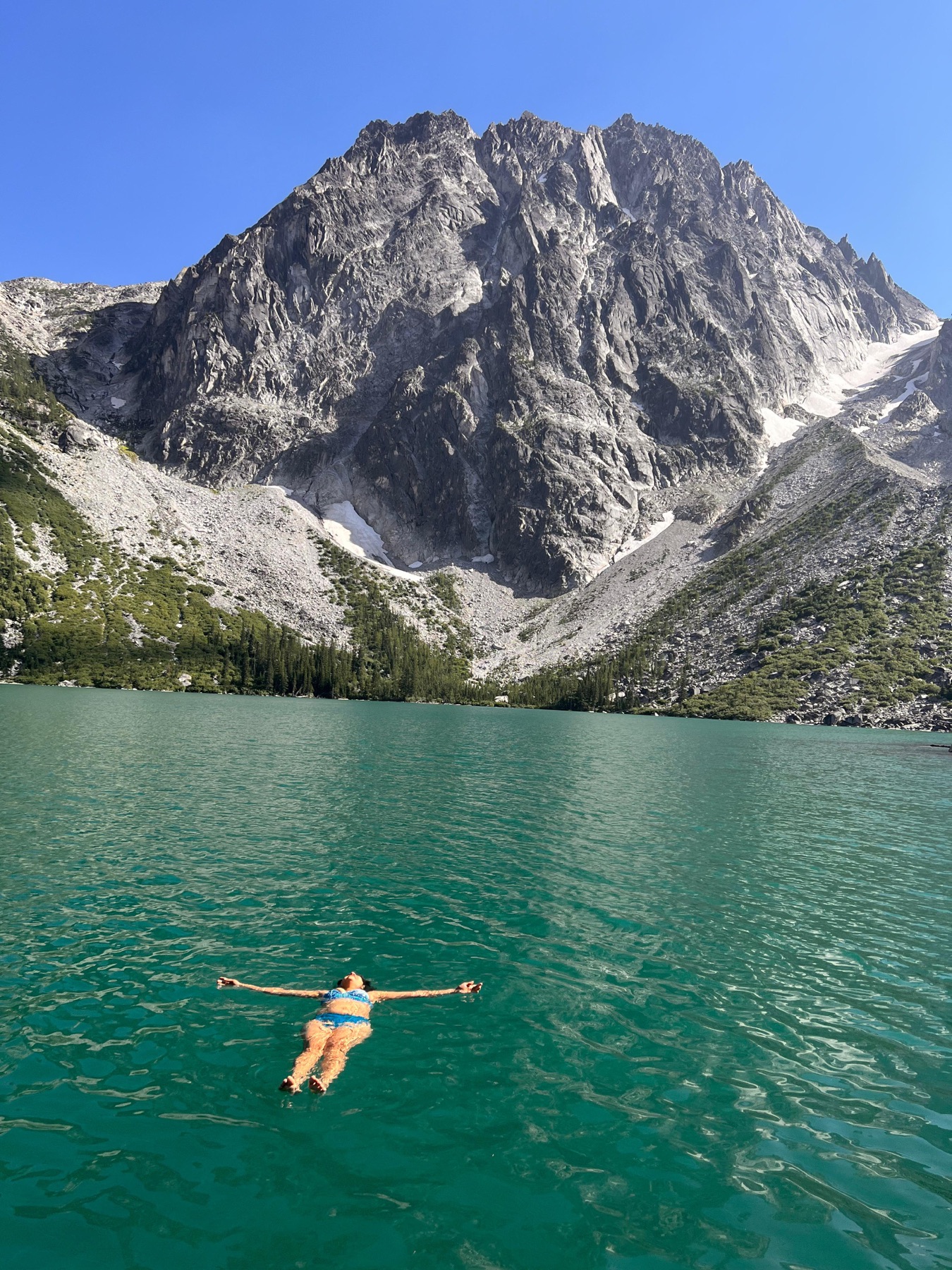 Floating in Colchuck Lake below Dragontail Peak